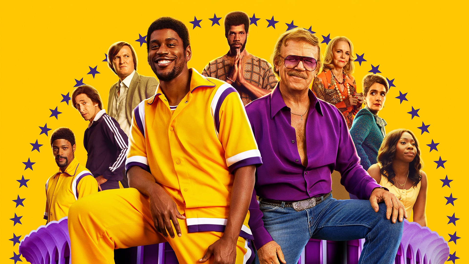 Winning Time: The Rise of the Lakers Dynasty; starring from back left: DeVaughn Dixon, Adrien Brody, Jason Clarke, Solomon Hughes, Sally Field, Gaby Hoffmann, and Tamera Tomakili. Front: Quincy Isaiah and John C. Reilly. Photo Credit: HBO Entertainment. (2022-)