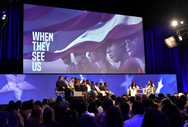 (Back Row:) Berry Welsh, Jonathan King, Freddy Miyares, Chris Chalk,Jovan Adepo, Justin Cunningham, Niecy Nash (Front Row:) Jane Rosenthal, Joshua Jackson, Michael K. Williams, Ethan Herisse, Asante Blackk and Jharrel Jerome onstage with Oprah Winfrey and Ava DuVernay at the Netflix "When They See Us" FYSEE Event at Raleigh Studios on June 09, 2019 in Los Angeles, California. Photo Credit: Emma McIntyre/Getty Images for Netflix