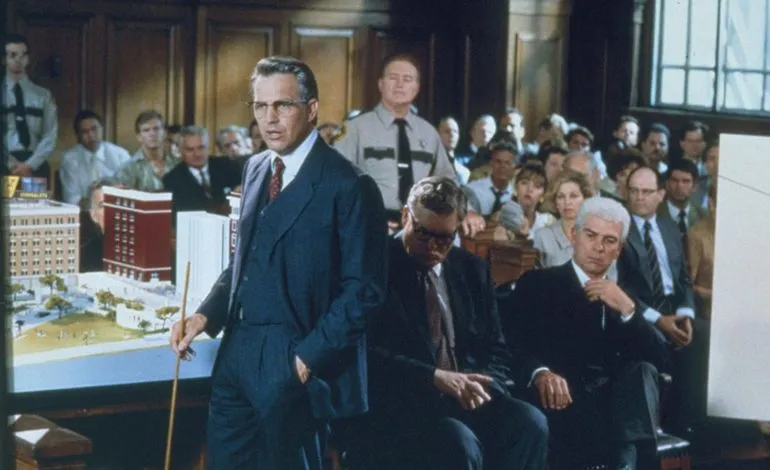 Kevin Costner, and Tommy Lee Jones in "JFK" (1991) Photo Credit: Warner Bros. Pictures