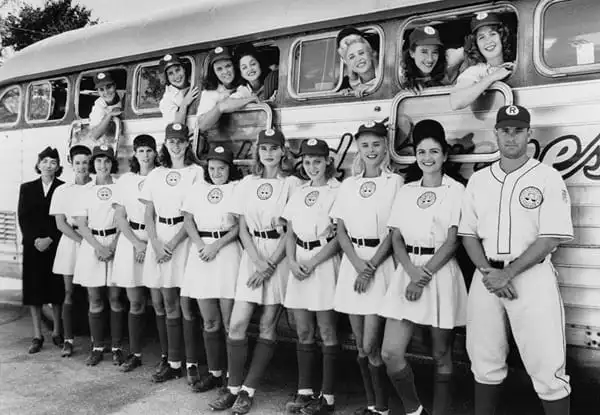 Geena Davis, Tom Hanks, Madonna, Lori Petty, Rosie O'Donnell, Megan Cavanagh, Renée Coleman, Ann Cusack, Robin Knight, Kathleen Marshall, Patti Pelton, Connie Pounds-Taylor, Anne Ramsay, Tracy Reiner, Bitty Schram, Kelli Simpkins, Freddie Simpson, Sharon Szmidt, and Neezer Tarleton in "A League of Their Own" (1992) Photo Credit: Columbia Pictures